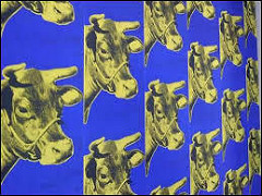 The entry corridor is laden with Warhol’s infamous repetitive cow mural motif